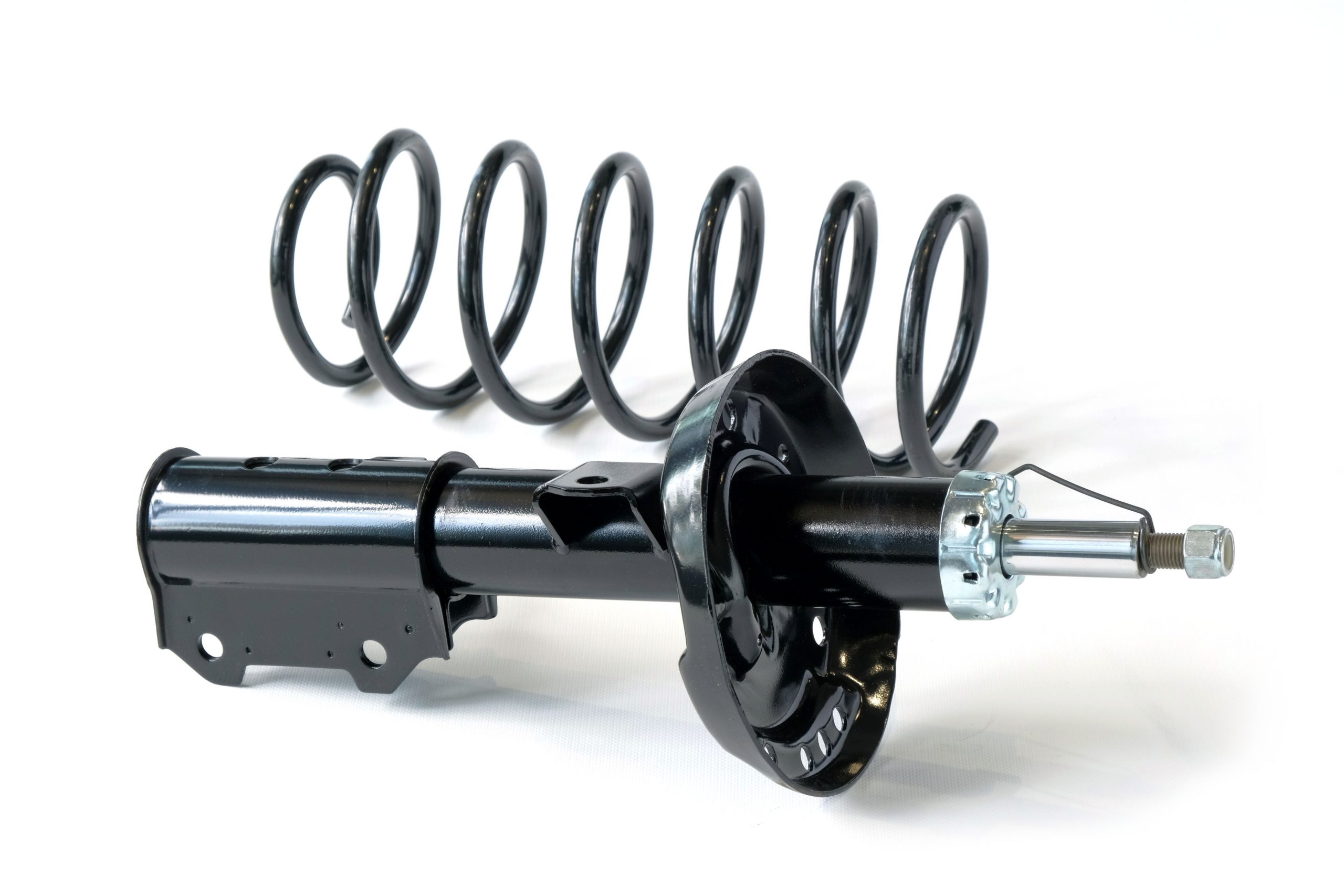 Shock,Absorber,And,Shock,Spring,Close-up,On,A,White,Background.